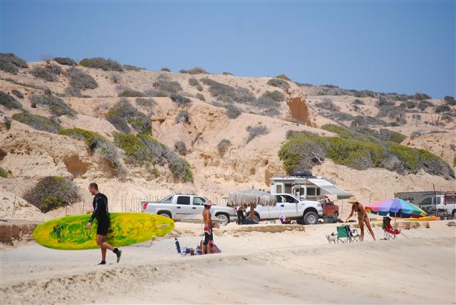 Surfers at East Cape