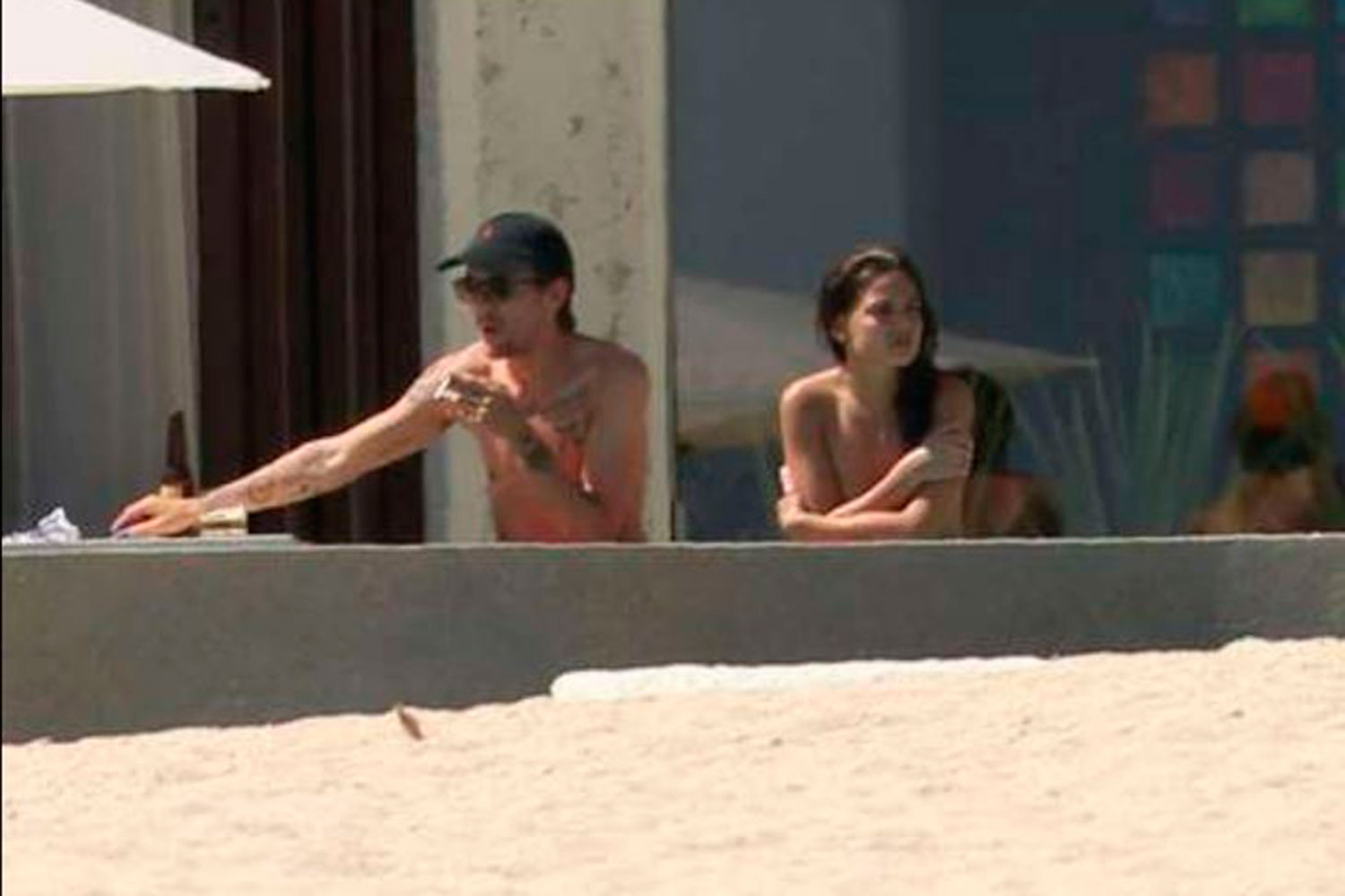 Louis Tomlinson, One Direction, snapped on vacation in Cabo with girlfriend...